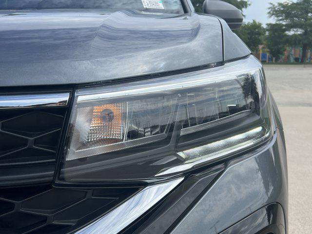used 2024 Volkswagen Taos car, priced at $22,993