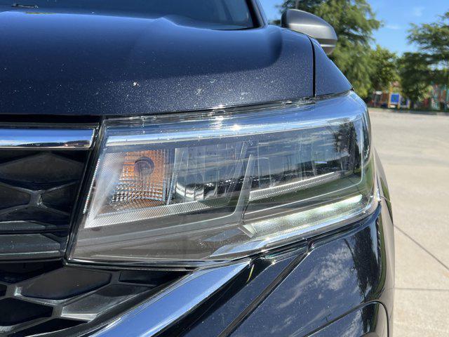 used 2022 Volkswagen Taos car, priced at $17,451