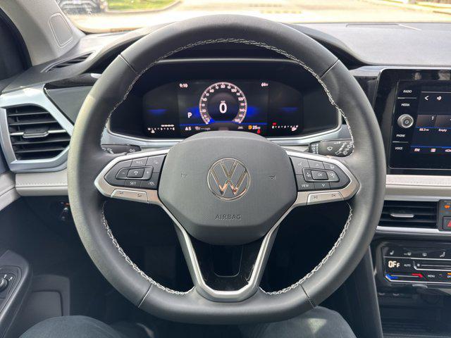 new 2025 Volkswagen Taos car, priced at $27,291