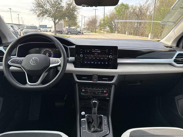new 2025 Volkswagen Taos car, priced at $27,291