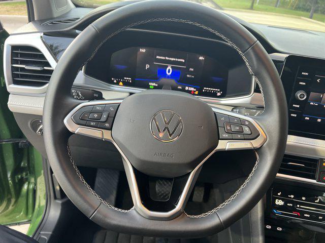 used 2025 Volkswagen Taos car, priced at $26,991