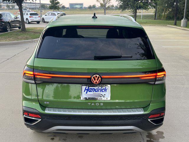 used 2025 Volkswagen Taos car, priced at $26,991