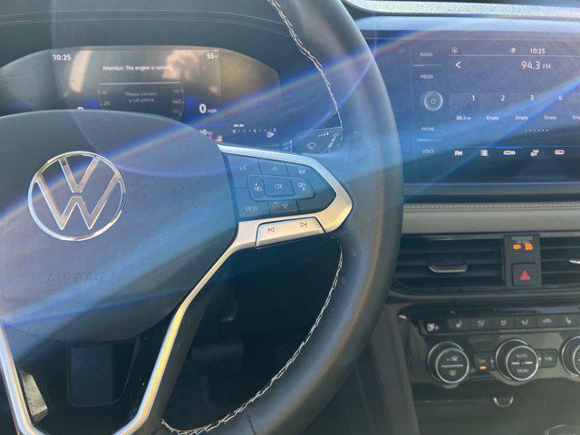 used 2024 Volkswagen Taos car, priced at $24,651