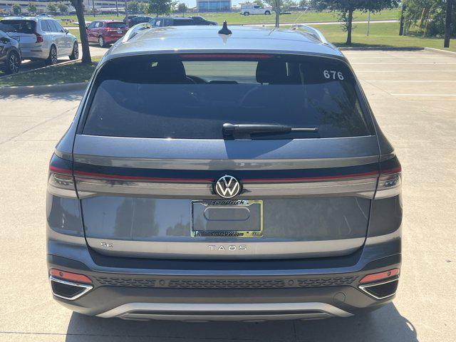 used 2025 Volkswagen Taos car, priced at $26,841
