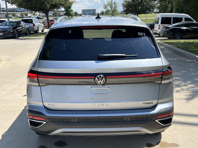 used 2025 Volkswagen Taos car, priced at $32,176