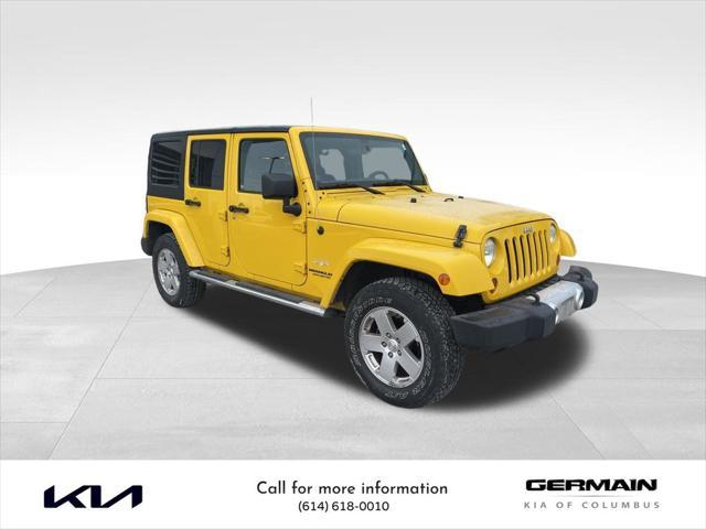 used 2011 Jeep Wrangler Unlimited car, priced at $15,491