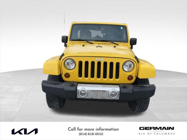 used 2011 Jeep Wrangler Unlimited car, priced at $15,491