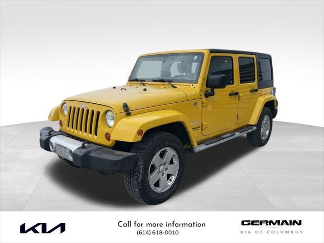 used 2011 Jeep Wrangler Unlimited car, priced at $15,491