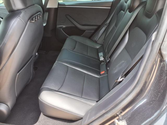 used 2024 Tesla Model 3 car, priced at $33,495