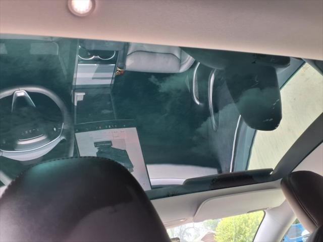 used 2024 Tesla Model 3 car, priced at $33,495