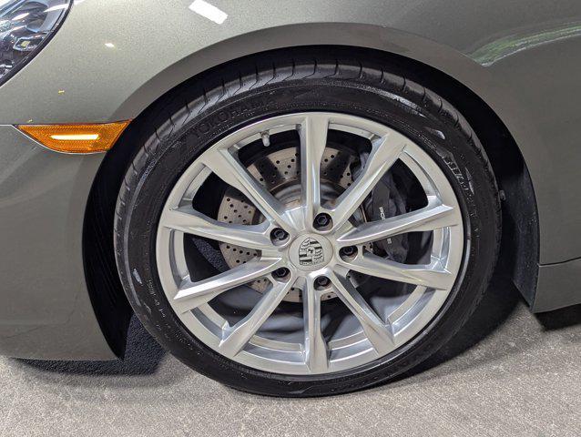 new 2025 Porsche 718 Boxster car, priced at $100,000