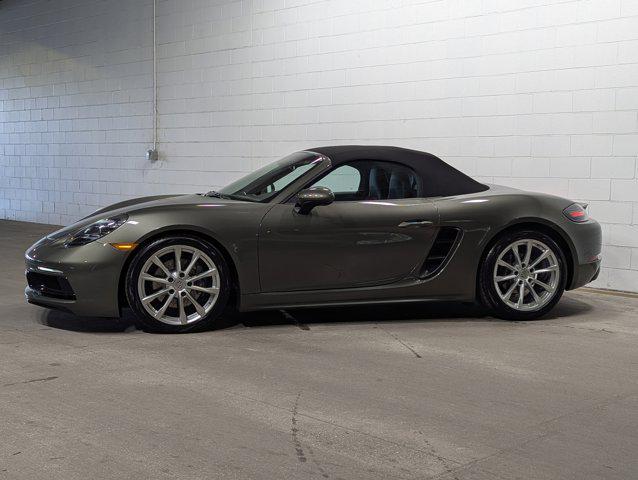 new 2025 Porsche 718 Boxster car, priced at $100,000