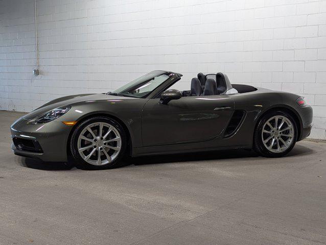 new 2025 Porsche 718 Boxster car, priced at $100,000