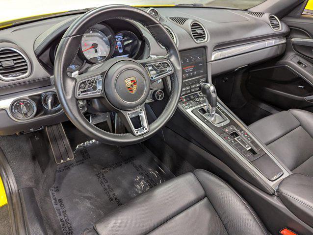 new 2024 Porsche 718 Boxster car, priced at $106,290