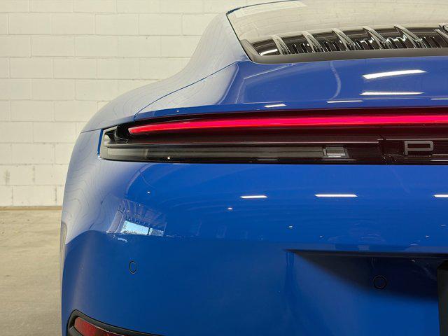 used 2025 Porsche 911 car, priced at $216,880