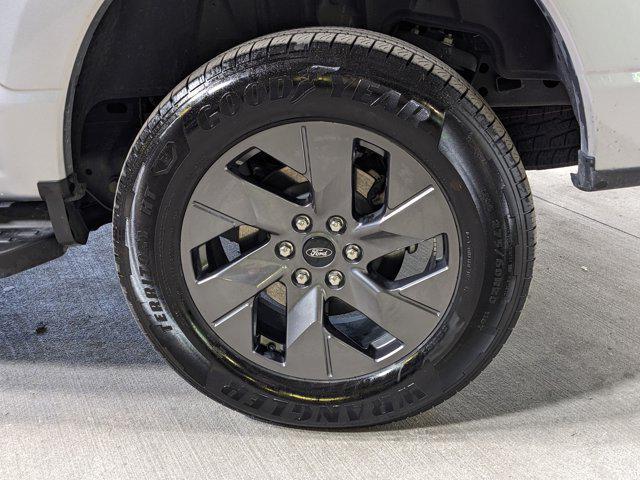 used 2024 Ford F-150 Lightning car, priced at $46,990