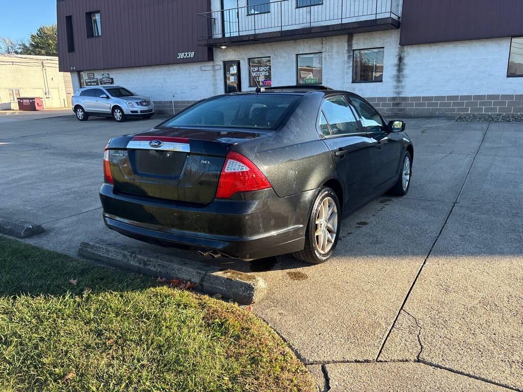 used 2012 Ford Fusion car, priced at $4,900