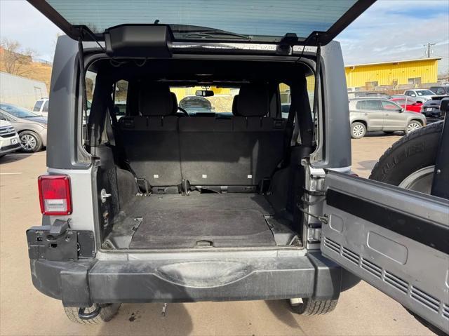 used 2013 Jeep Wrangler Unlimited car, priced at $18,593