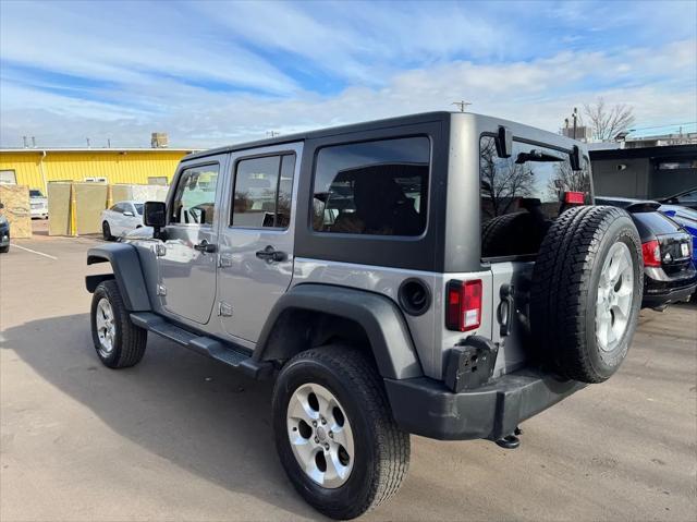 used 2013 Jeep Wrangler Unlimited car, priced at $18,593