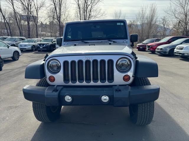 used 2013 Jeep Wrangler Unlimited car, priced at $18,593