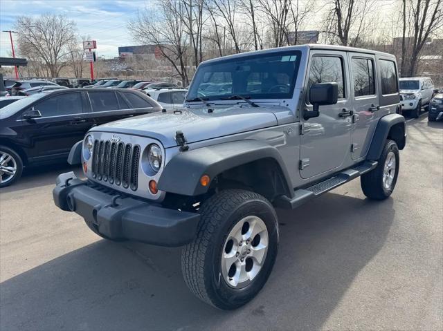 used 2013 Jeep Wrangler Unlimited car, priced at $18,593