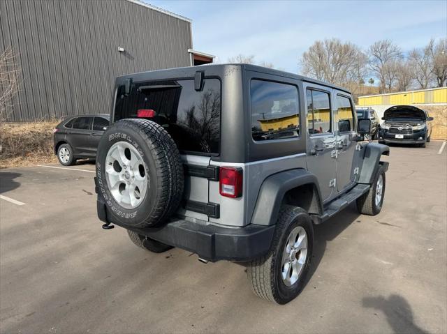 used 2013 Jeep Wrangler Unlimited car, priced at $18,593