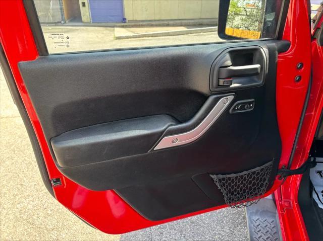 used 2015 Jeep Wrangler Unlimited car, priced at $18,794