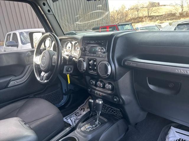 used 2015 Jeep Wrangler Unlimited car, priced at $20,992