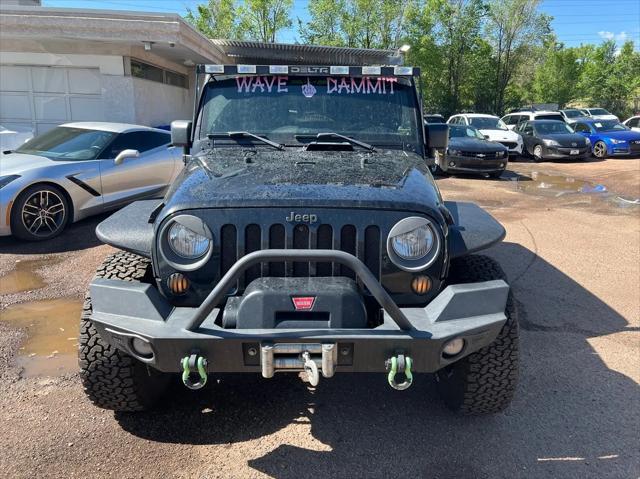 used 2011 Jeep Wrangler Unlimited car, priced at $17,792