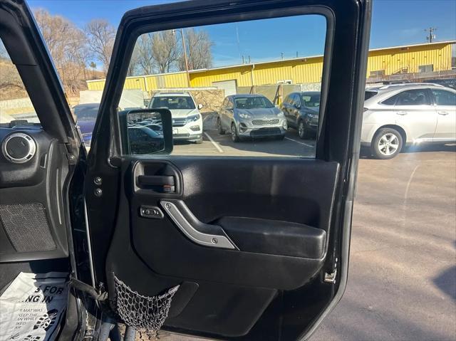 used 2015 Jeep Wrangler Unlimited car, priced at $18,995