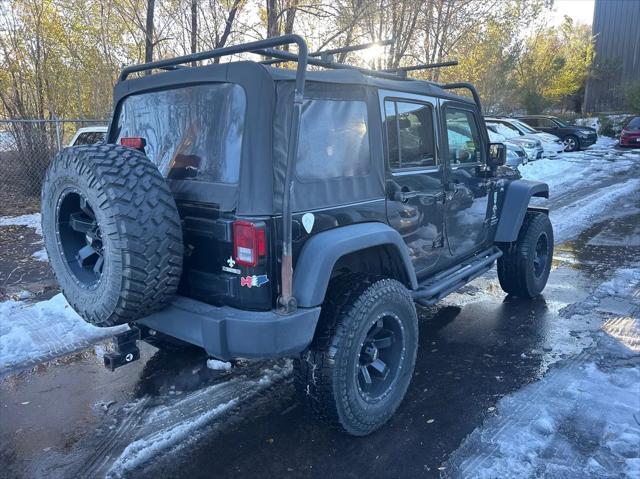 used 2015 Jeep Wrangler Unlimited car, priced at $21,499