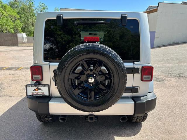 used 2012 Jeep Wrangler Unlimited car, priced at $15,792