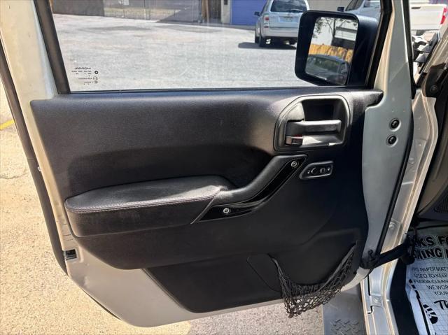 used 2012 Jeep Wrangler Unlimited car, priced at $15,792