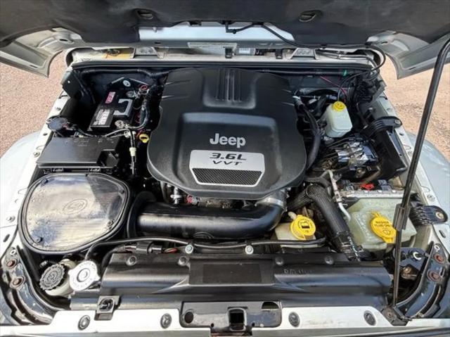 used 2012 Jeep Wrangler Unlimited car, priced at $15,792