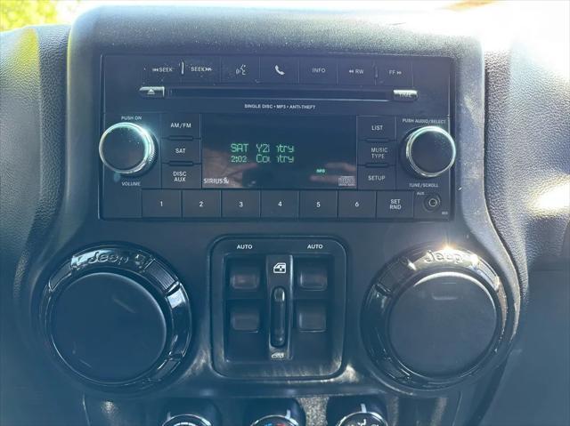 used 2012 Jeep Wrangler Unlimited car, priced at $15,792