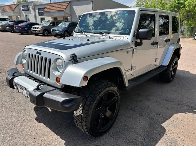 used 2012 Jeep Wrangler Unlimited car, priced at $15,792