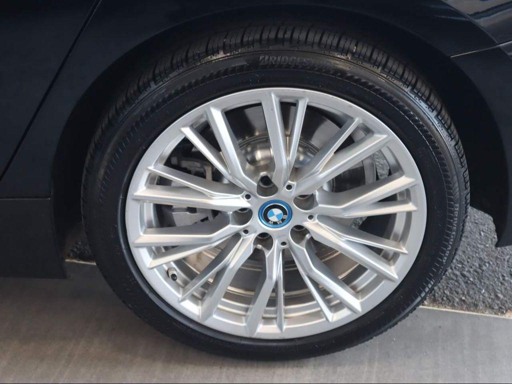 used 2024 BMW 330e car, priced at $33,524