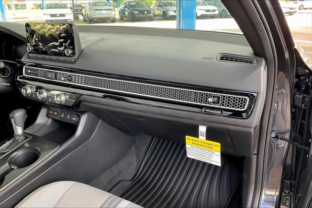 used 2025 Honda Civic Hybrid car, priced at $27,599