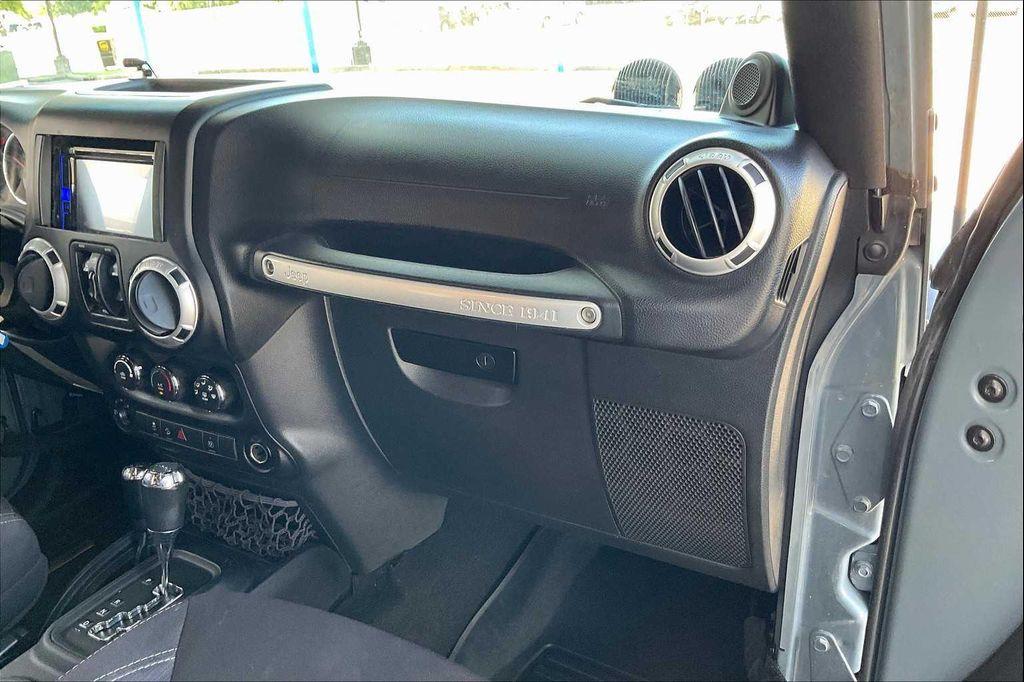 used 2014 Jeep Wrangler Unlimited car, priced at $14,399