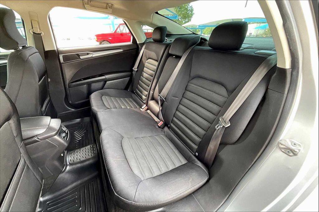 used 2015 Ford Fusion car, priced at $5,599