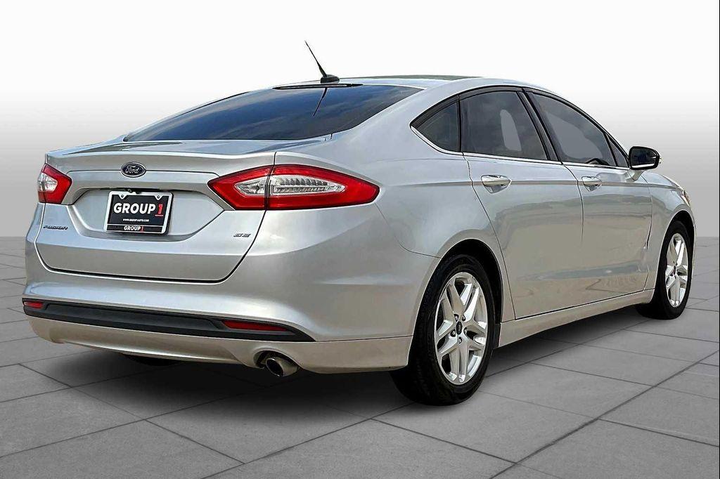 used 2015 Ford Fusion car, priced at $5,599