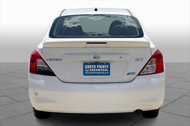 used 2013 Nissan Versa car, priced at $2,999