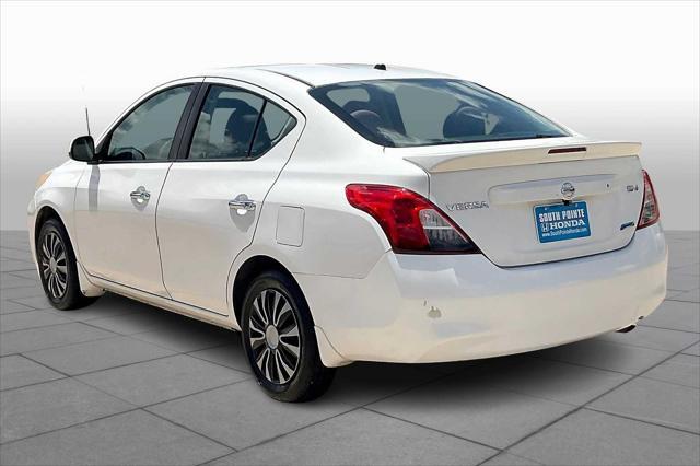 used 2013 Nissan Versa car, priced at $2,999