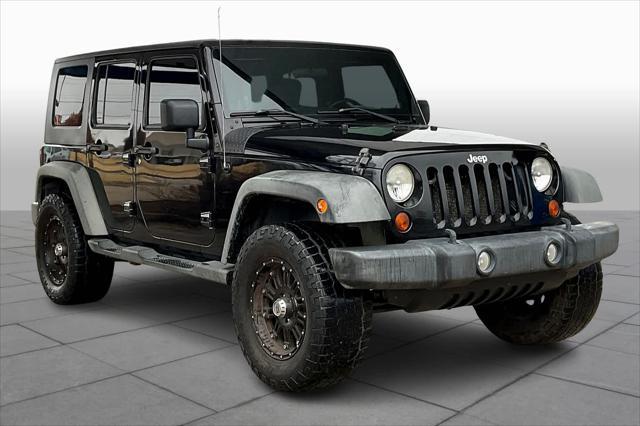 used 2010 Jeep Wrangler Unlimited car, priced at $14,399