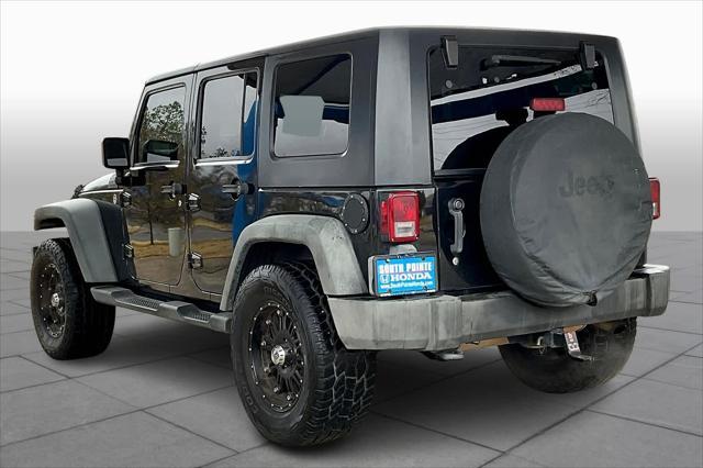 used 2010 Jeep Wrangler Unlimited car, priced at $14,399