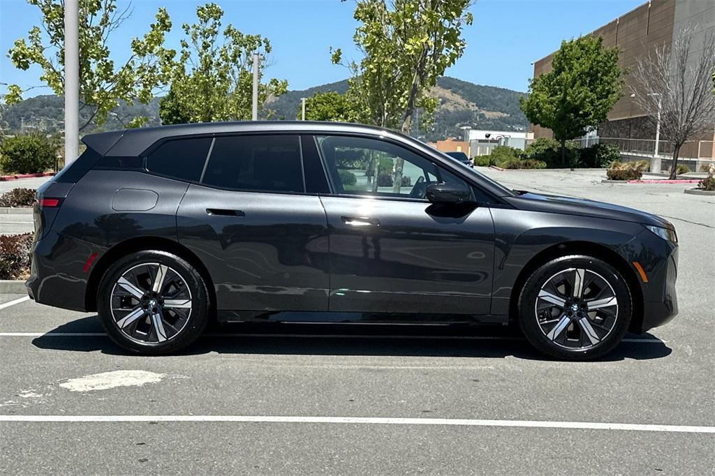 new 2026 BMW iX car, priced at $97,825