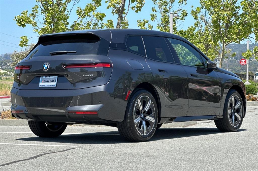 new 2026 BMW iX car, priced at $97,825