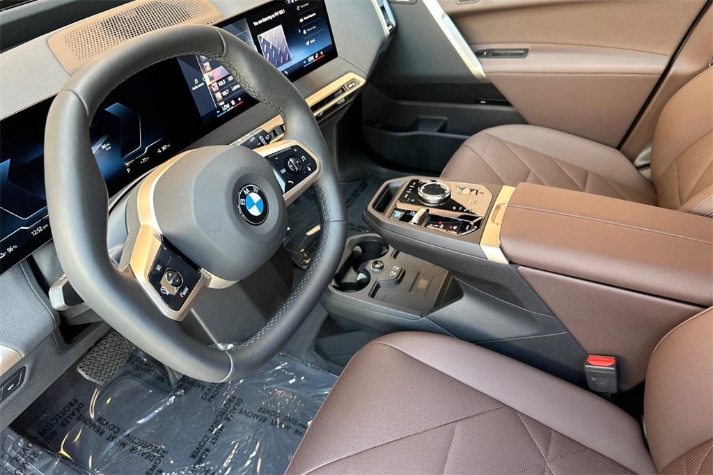 new 2026 BMW iX car, priced at $97,825