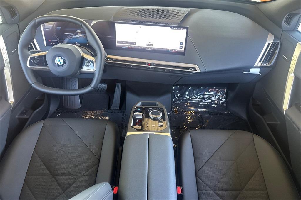 new 2026 BMW iX car, priced at $83,520