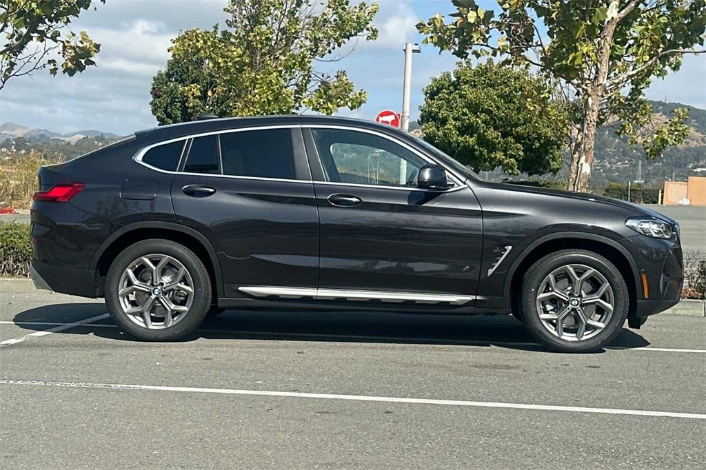 used 2025 BMW X4 car, priced at $51,988